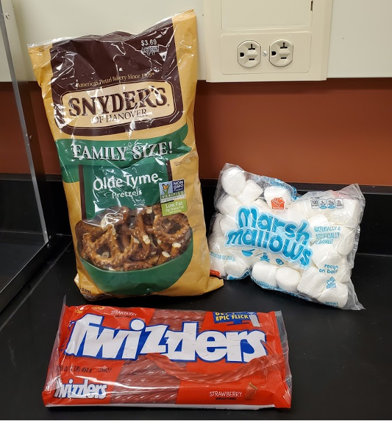 a bag pretzels, marshmallows, and twirlers 